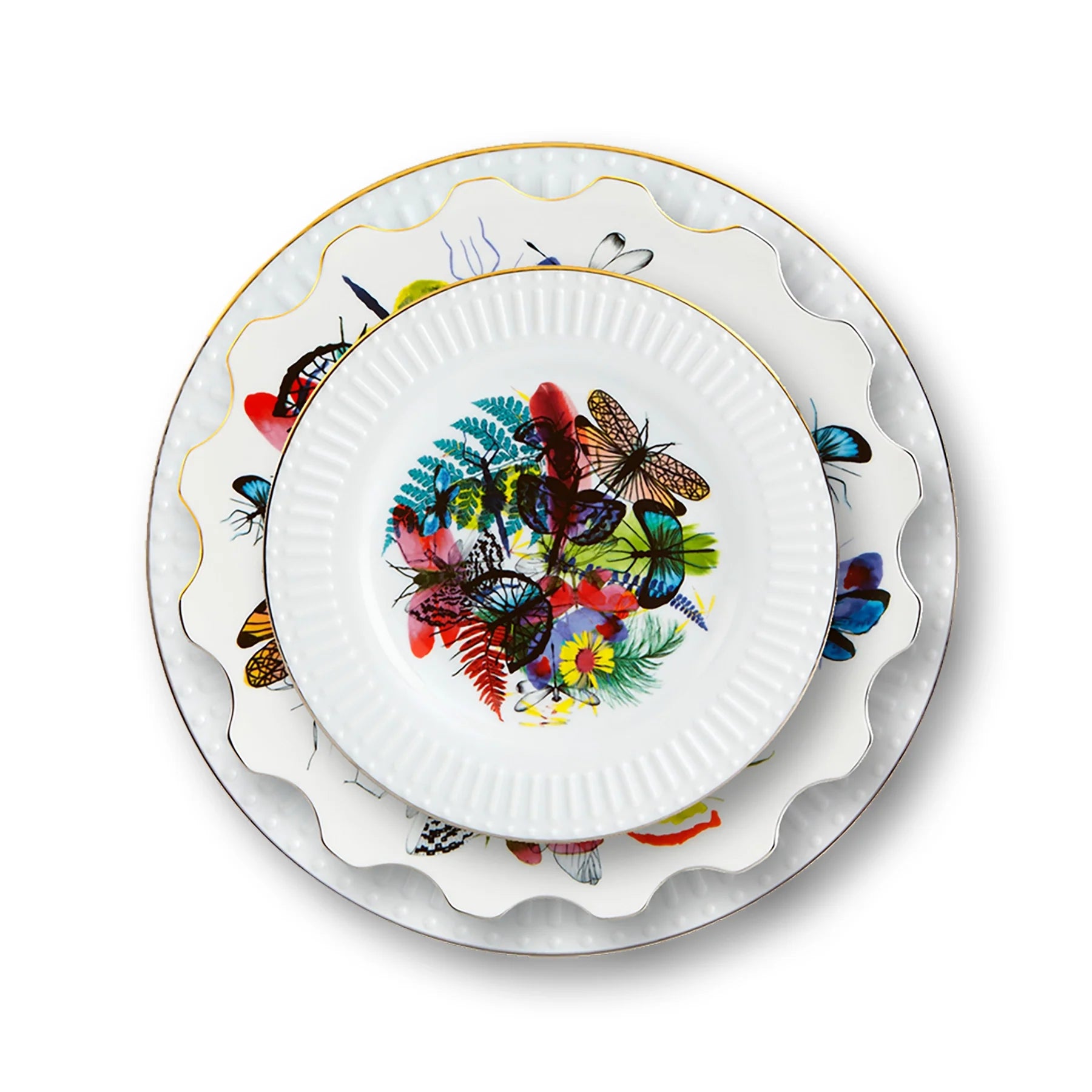 Platos de puesto de la Colección Caribe de Vista Alegre x Christian Lacroix, con motivos de fauna y flora tropical.