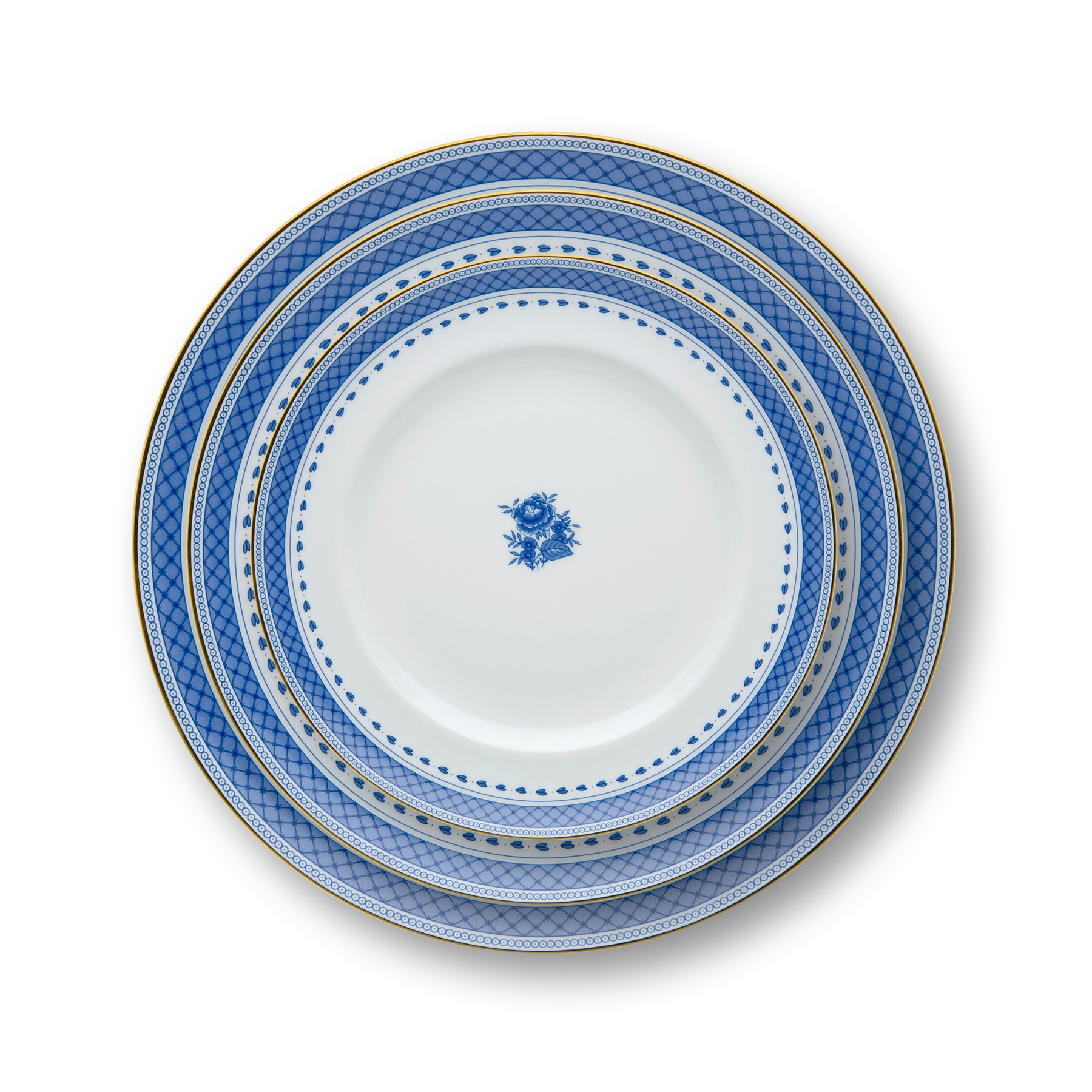 Set de platos de la colección Cozinha Velha de Vista Alegre, mostrando el diseño rústico y los bordes en oro.