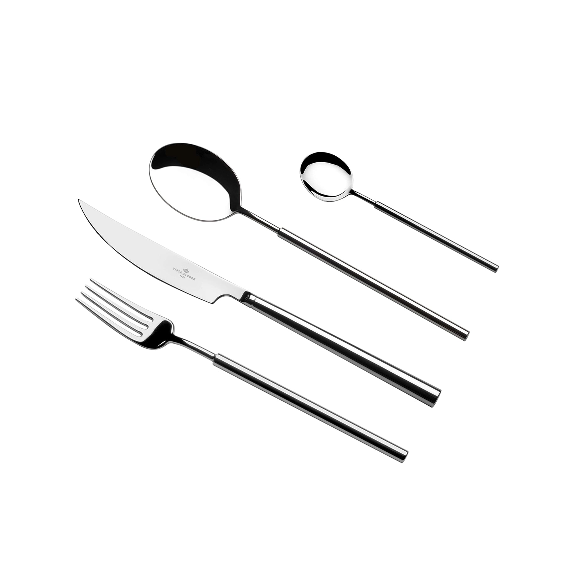 Set de cubiertos de la colección Domo de Vista Alegre en una mesa, mostrando las líneas suaves y el diseño minimalista.