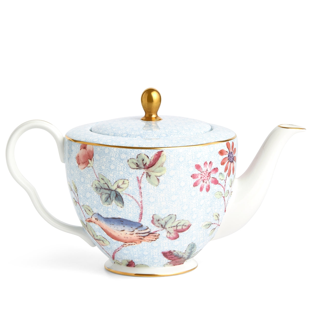 Tetera Grande Cuckoo de porcelana fina con detalles dorados y motivos florales.