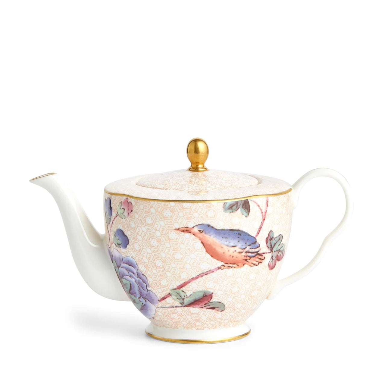 Tetera Pequeña Cuckoo de porcelana fina con detalles en oro 22K.
