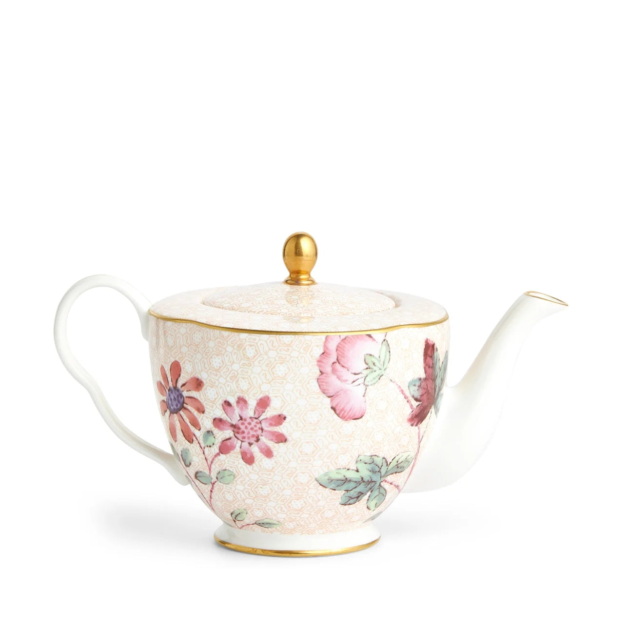 Tetera Pequeña Cuckoo de porcelana fina con detalles en oro 22K.