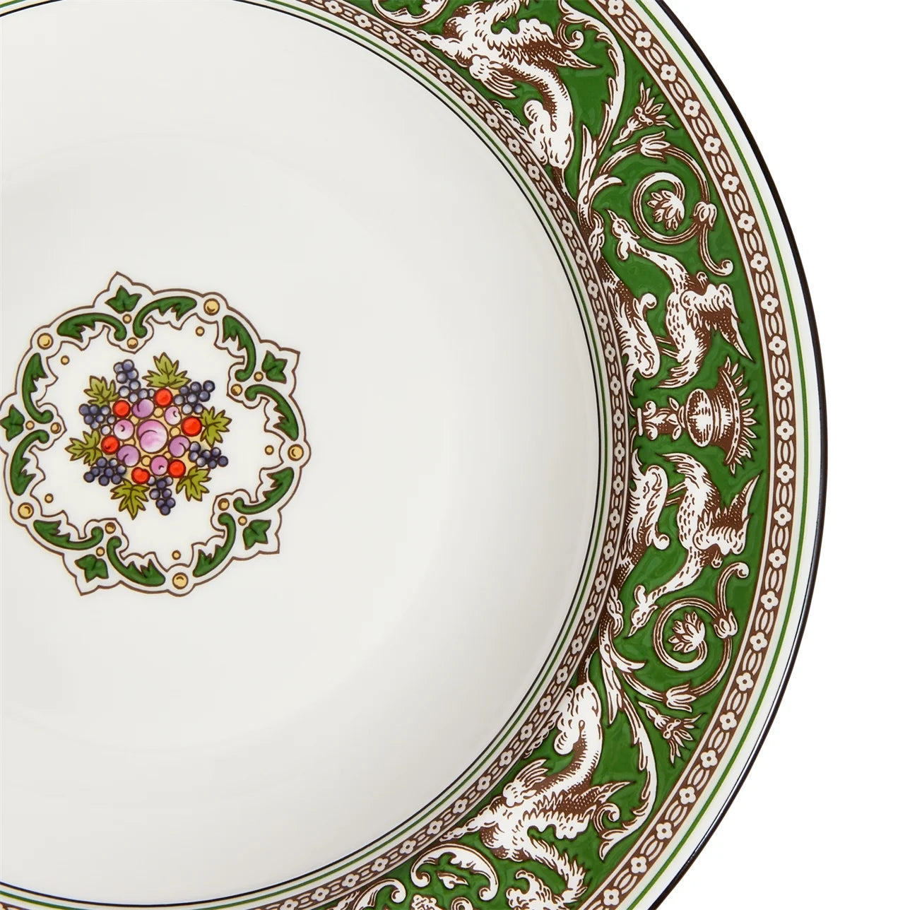 Detalle del borde verde vibrante en el plato hondo Florentine de porcelana.