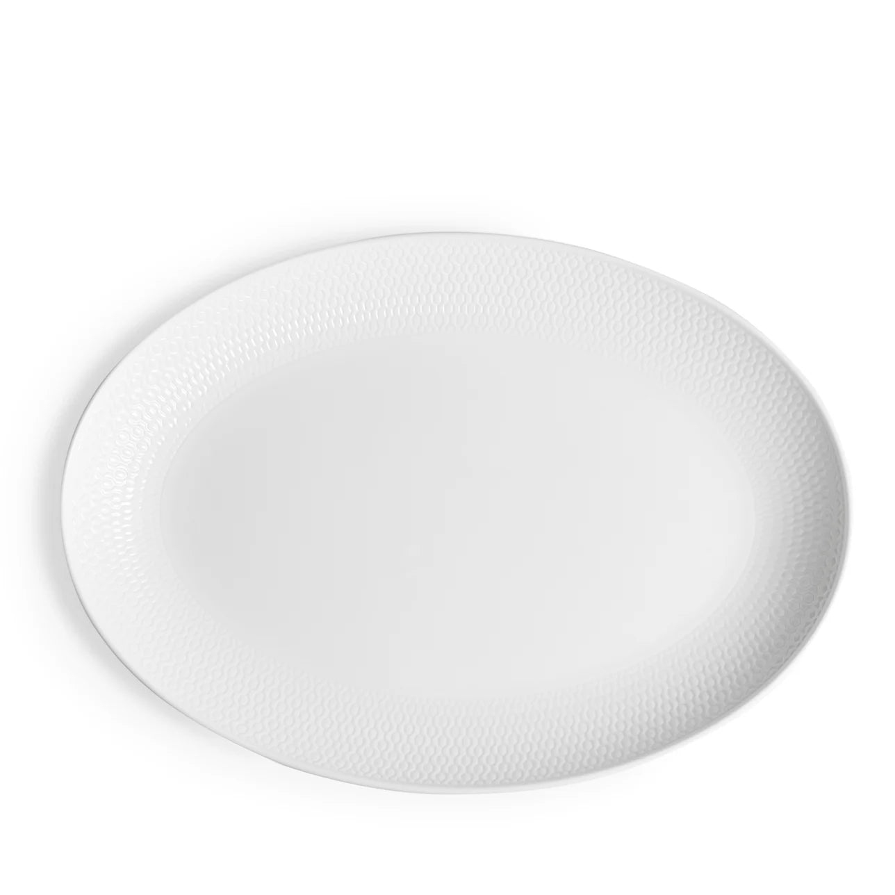 Bandeja ovalada Gio de porcelana fina blanca con diseño geométrico.