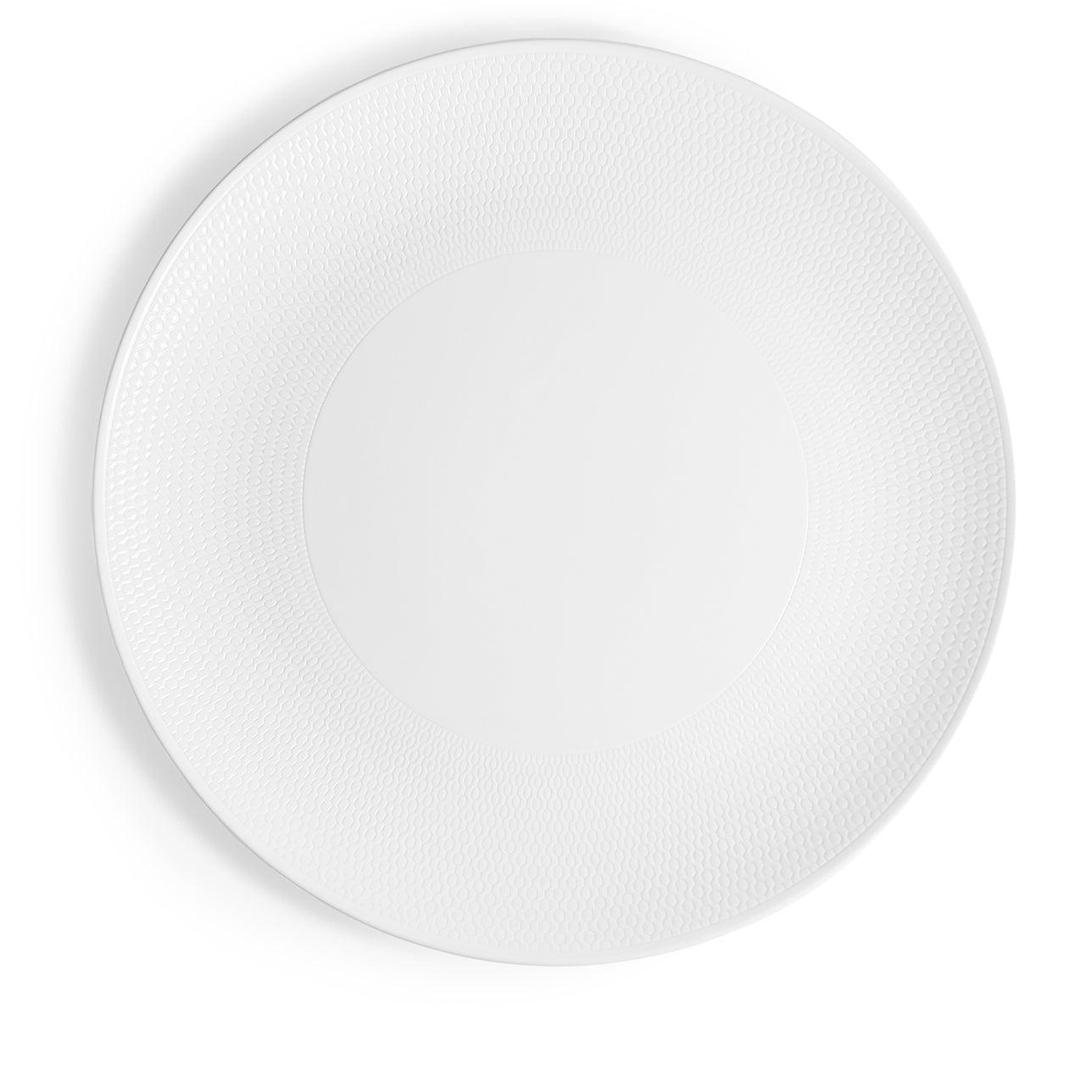 Plato de presentación Gio 31cm de porcelana con textura sutil.