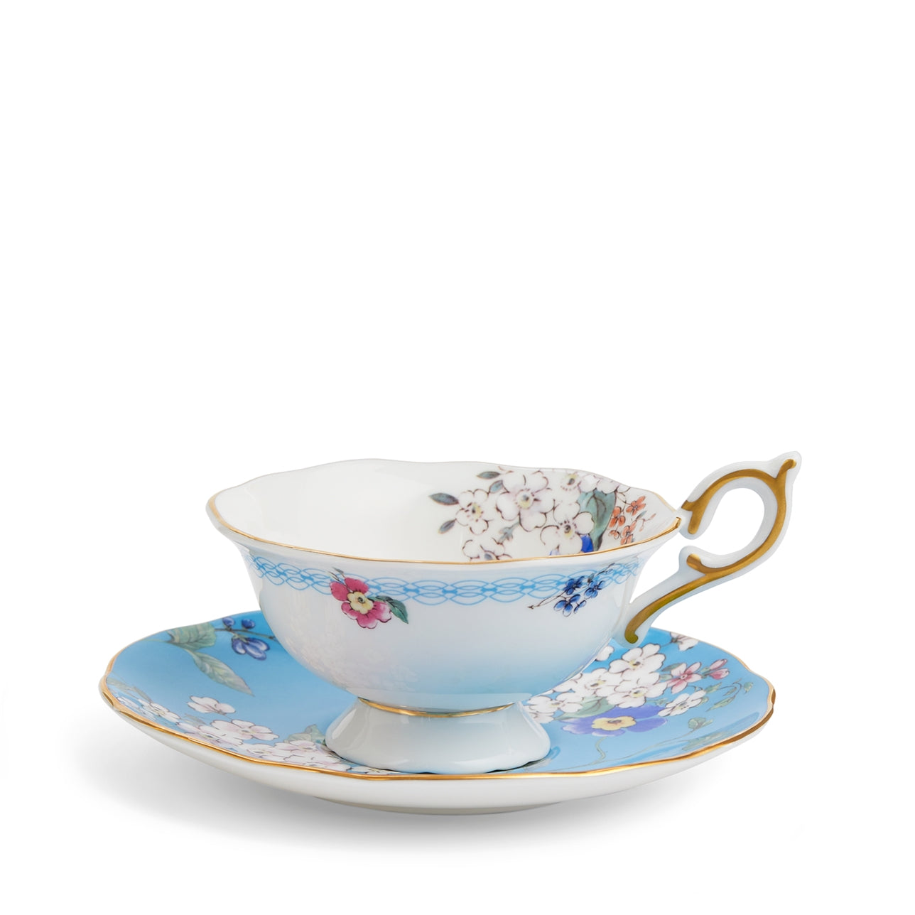 Taza y platillo Apple Blossom Wonderlust sobre fondo blanco