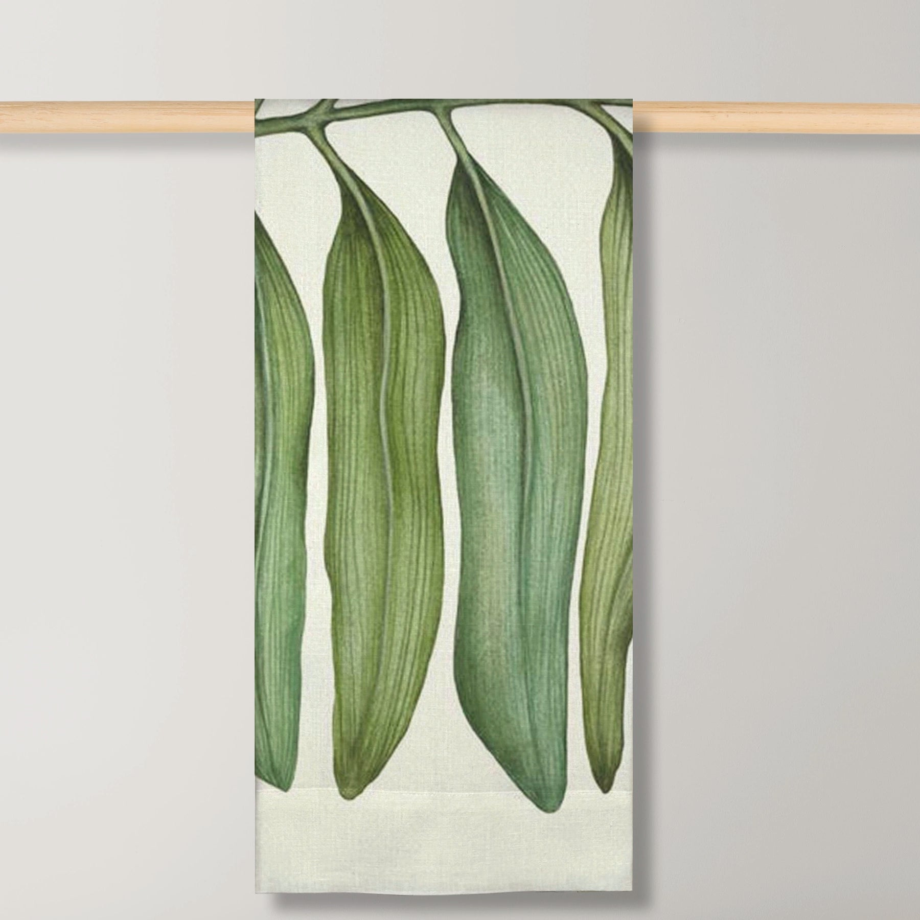 Primer plano del Mantél Tamarindo, enfocando la textura del lino 100% y la calidad de la impresión del patrón.