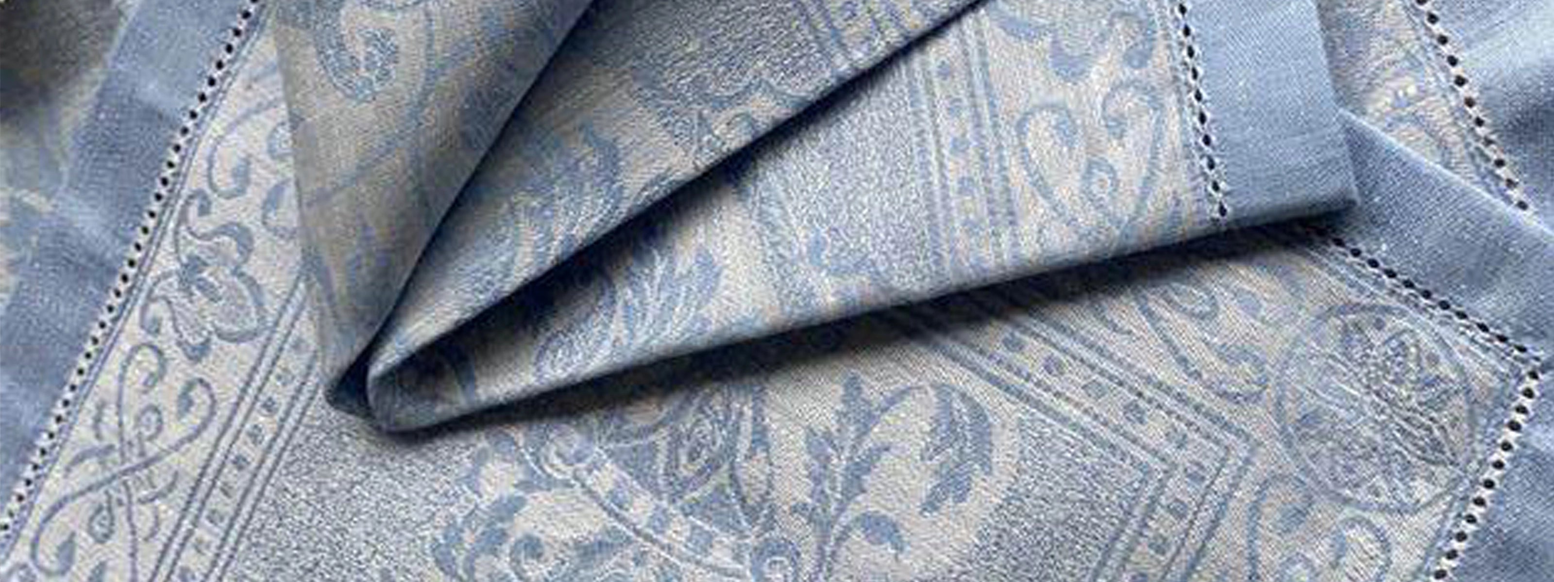 Texteis Iris, mantelería de lino portugués con diseños únicos y artesanía de lujo.