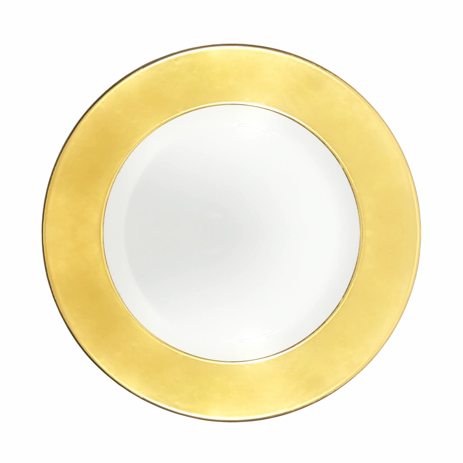 Plato base Aba Vista Alegre sobre mesa contemporánea