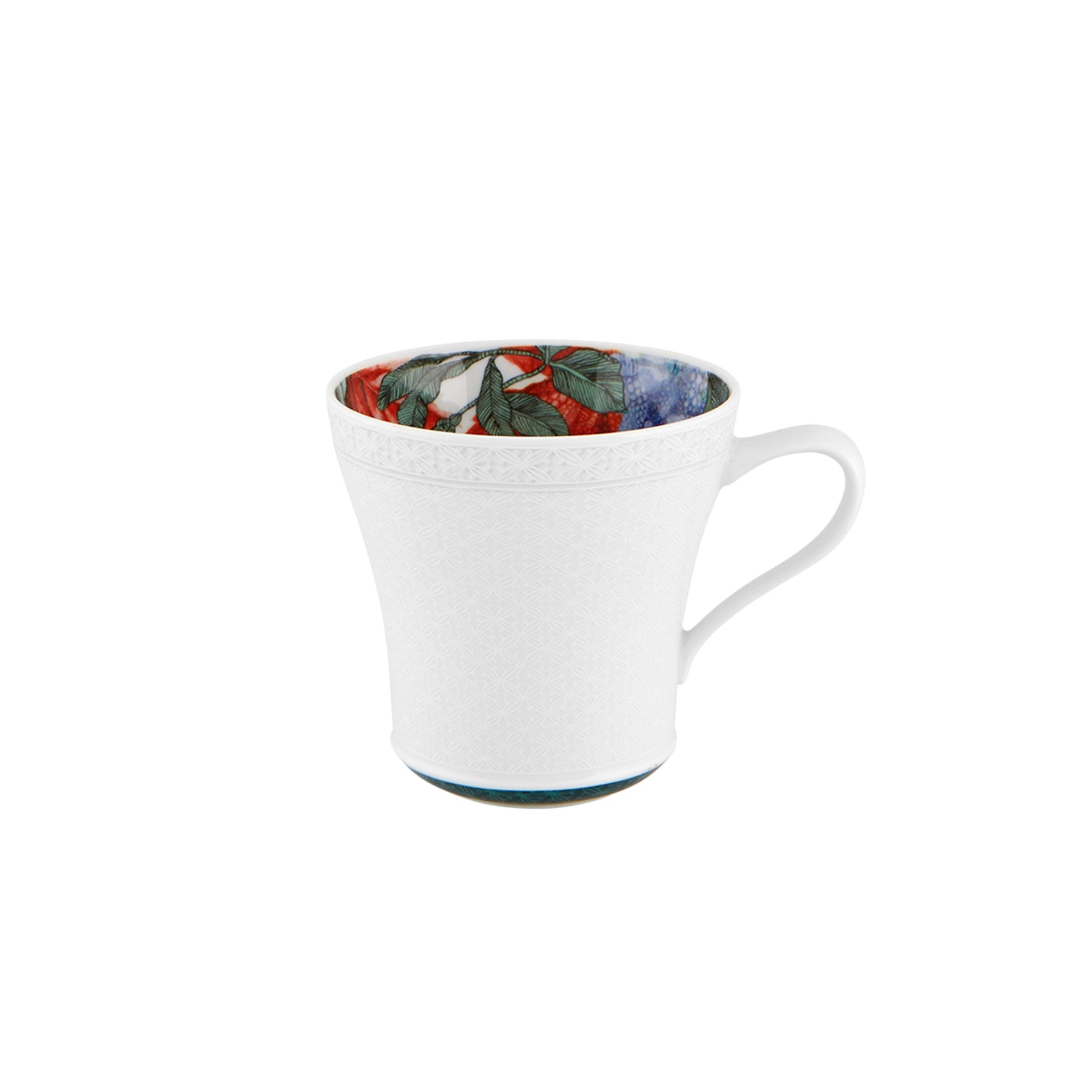Mug Duality de Vista Alegre, mostrando claramente el contraste entre la mitad blanca clásica y el patrón floral colorido.