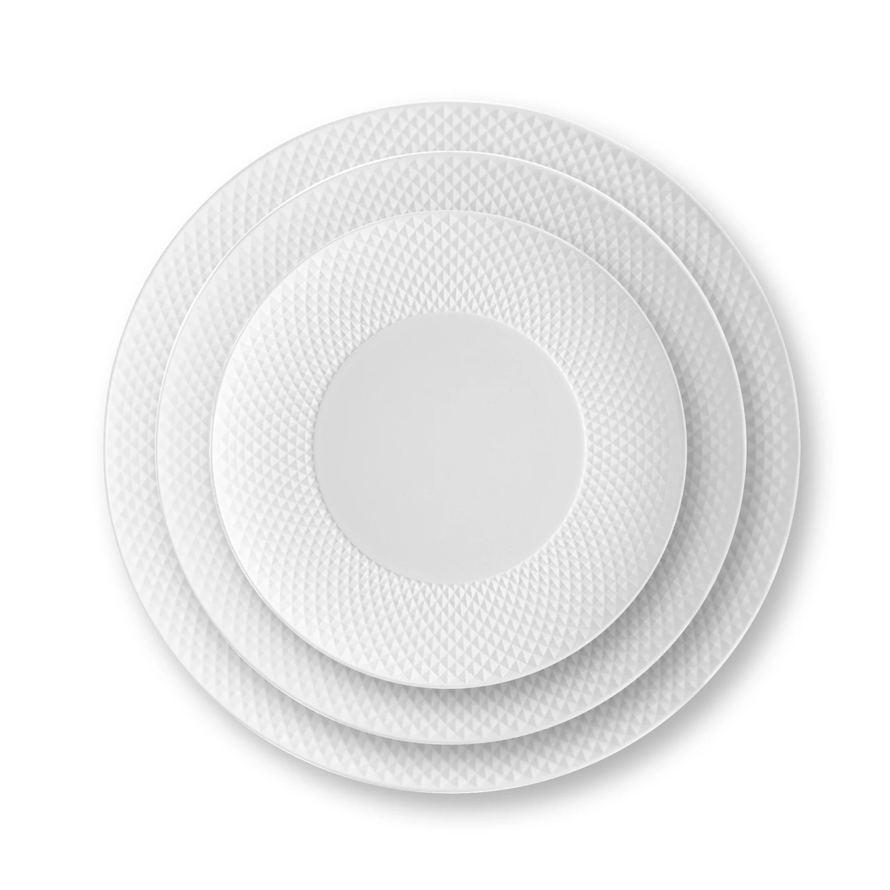 Set de platos de la Vajilla Bicos de Vista Alegre en porcelana, mostrando la sutil textura geométrica.