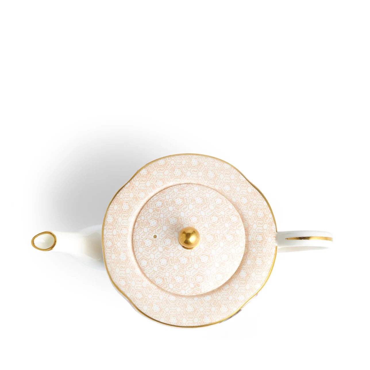 Tetera Pequeña Cuckoo de porcelana fina con detalles en oro 22K.