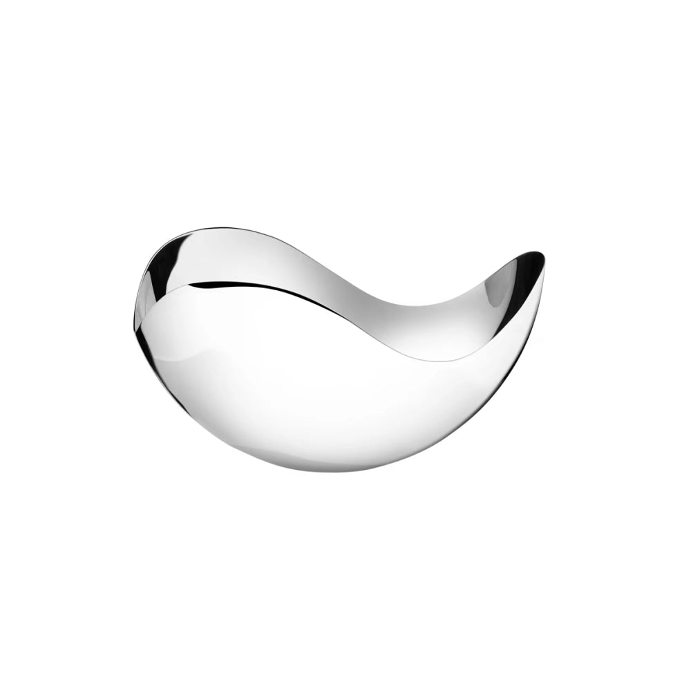 Primer plano del bowl petit Bloom, resaltando el brillo del acero inoxidable pulido a espejo y las formas orgánicas.